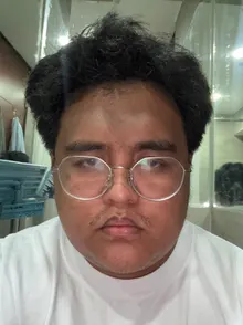The original source selfie used as the 'before' for every portrait